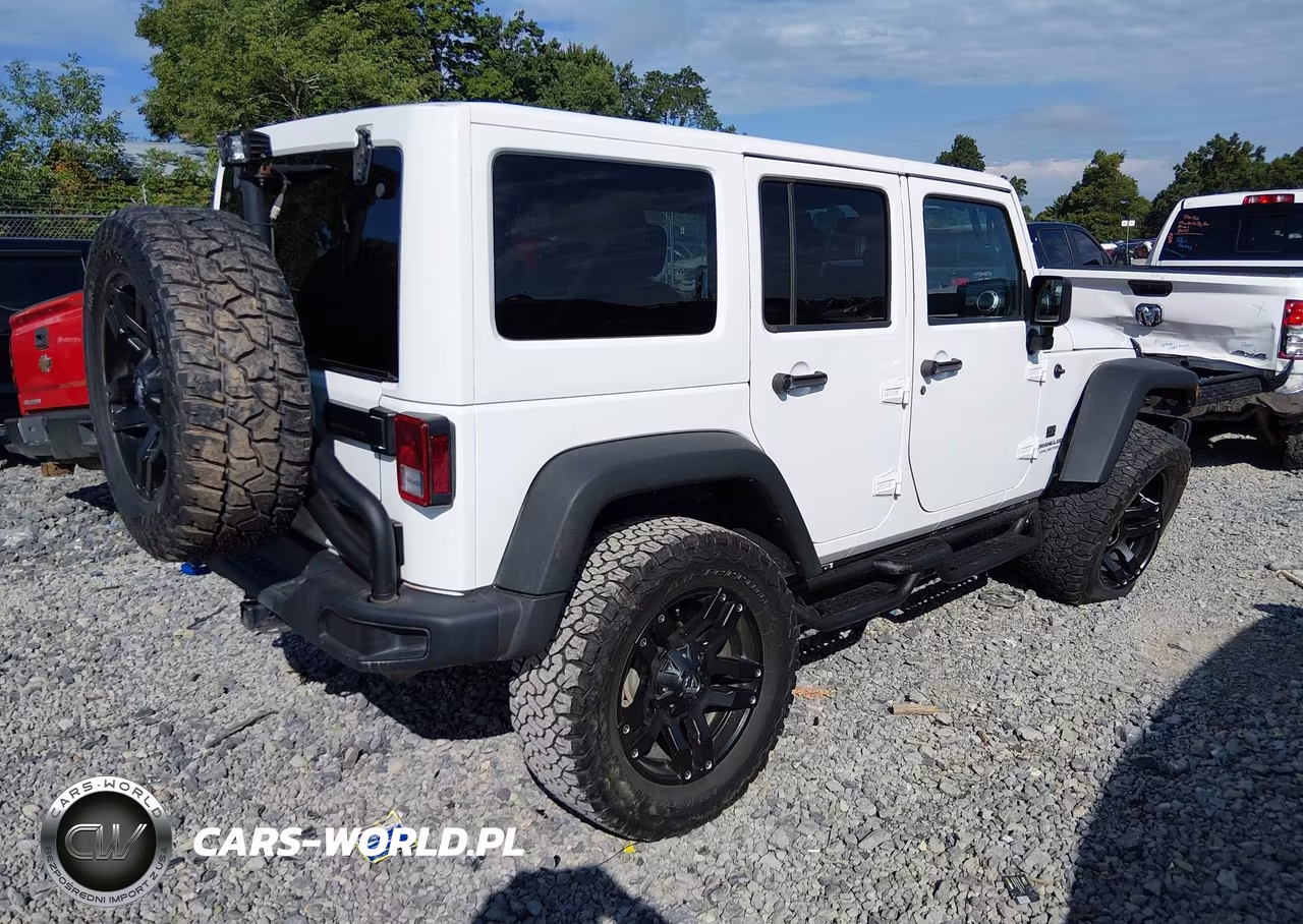 2015 Jeep Wrangler Unlimited Rubicon Hard Rock VIN:1C4BJWFG5FL662628 - 4
