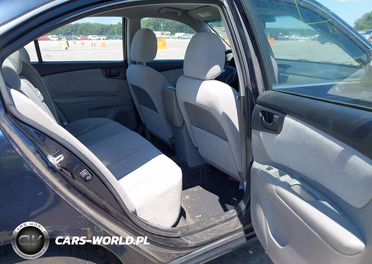 2009 Kia Optima Lx VIN:KNAGE228695296976 - 8