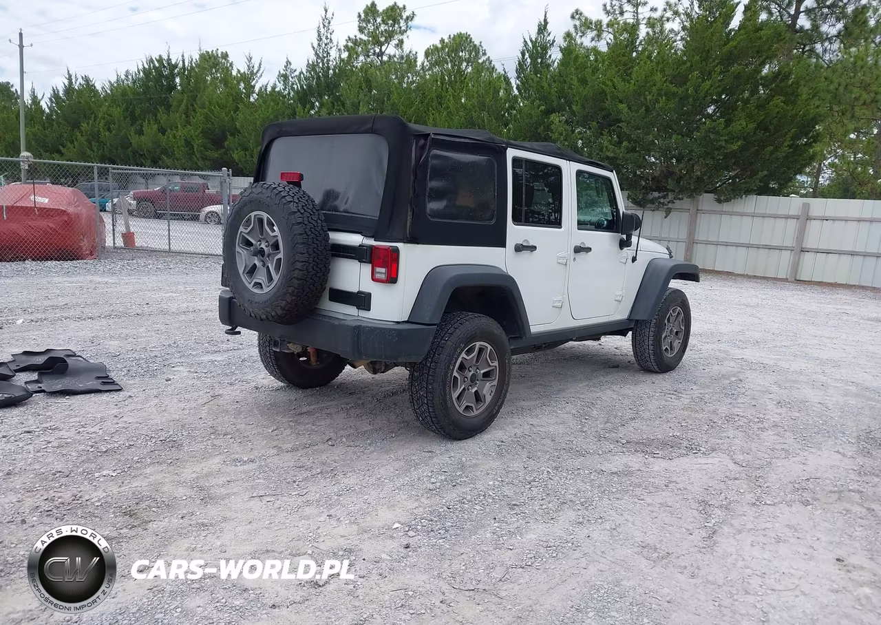 2015 Jeep Wrangler Unlimited Rubicon VIN:1C4BJWFG7FL515095 - 4
