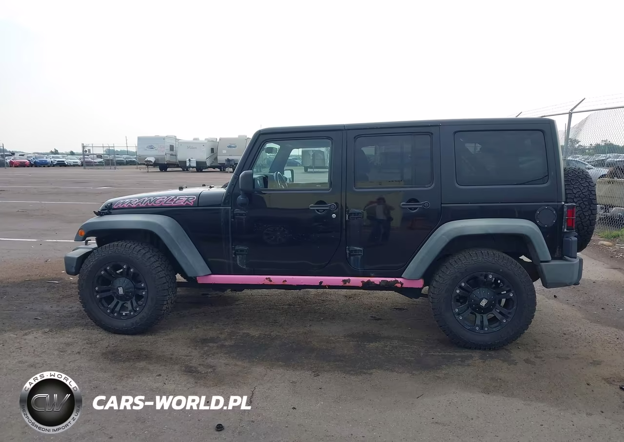 2011 Jeep Wrangler Unlimited Rubicon VIN:1J4HA6H1XBL566887 - 14