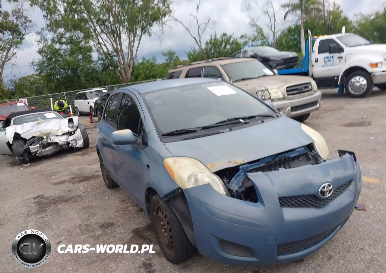 2009 Toyota Yaris VIN:JTDKT903095257139 - 12