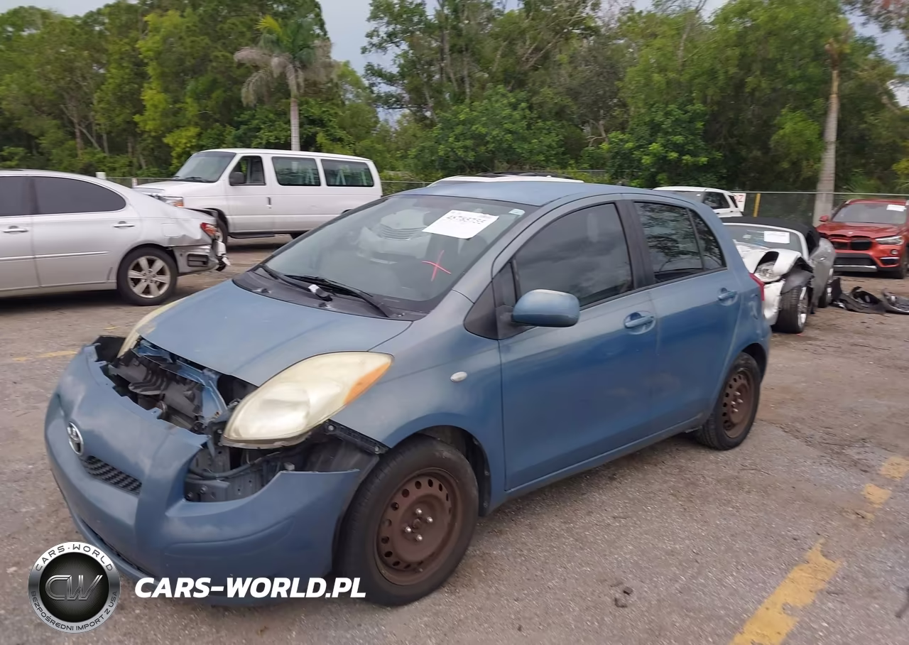 2009 Toyota Yaris VIN:JTDKT903095257139 - 13