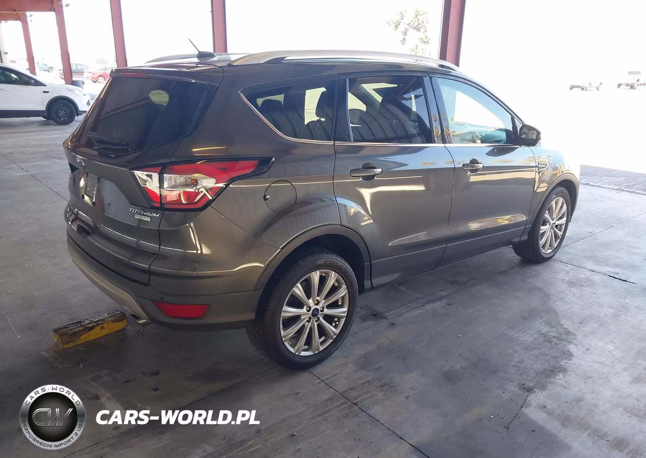 2017 Ford Escape Titanium VIN:1FMCU0JD7HUC80647 - 4