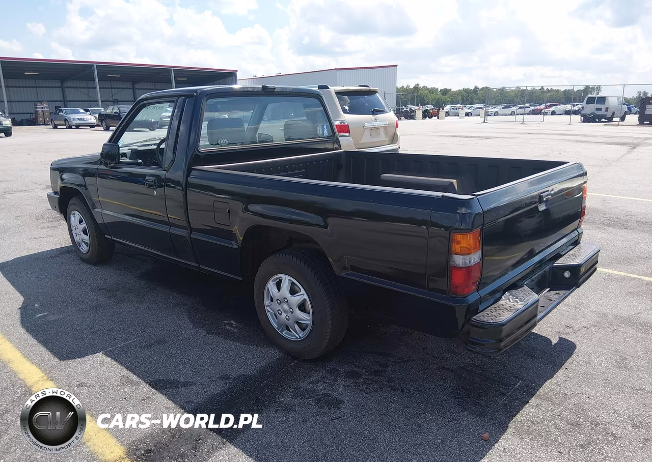 1990 Mitsubishi Mighty Max - S VIN:JA7FL24W1LP011061 - 3