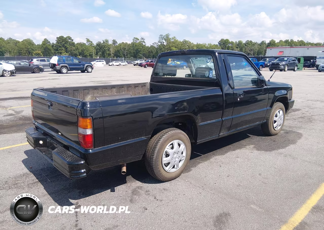 1990 Mitsubishi Mighty Max - S VIN:JA7FL24W1LP011061 - 4