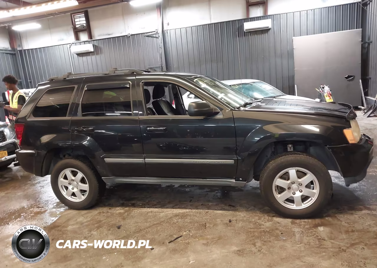 2009 Jeep Grand Cherokee Laredo VIN:1J8GR48KX9C522012 - 13
