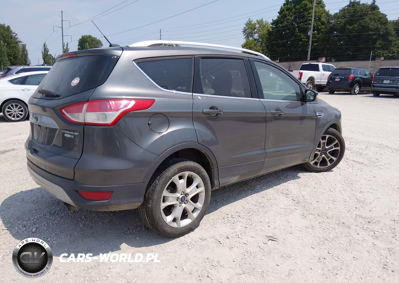 2015 Ford Escape Titanium VIN:1FMCU9JX0FUC62129 - 4
