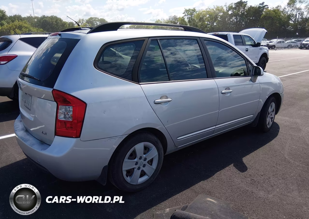 2009 Kia Rondo Lx VIN:KNAFG528897261027 - 4