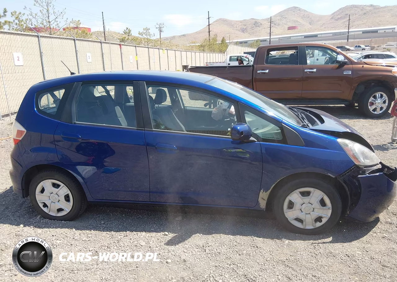 2012 Honda Fit VIN:JHMGE8H35CC004947 - 13