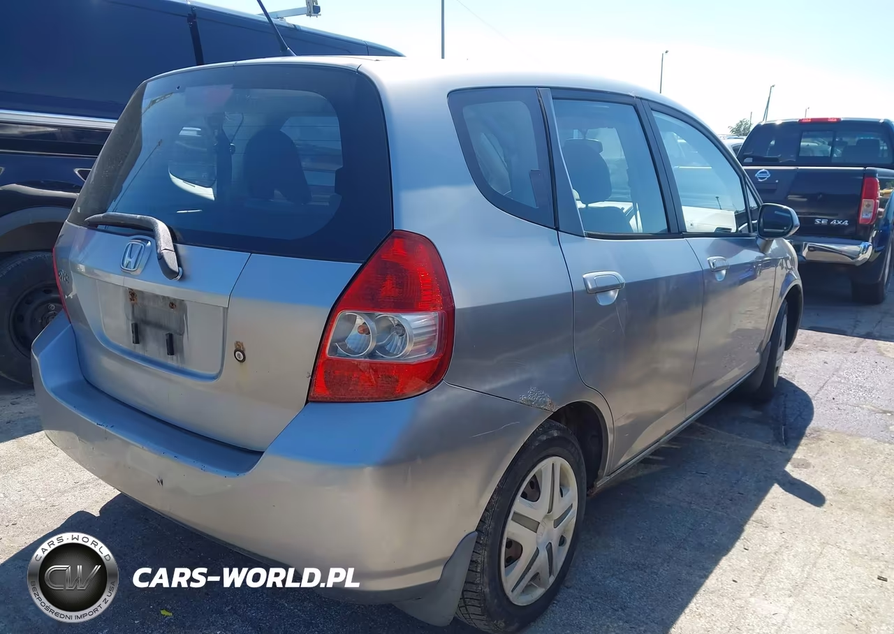 2007 Honda Fit VIN:JHMGD37457S002563 - 4