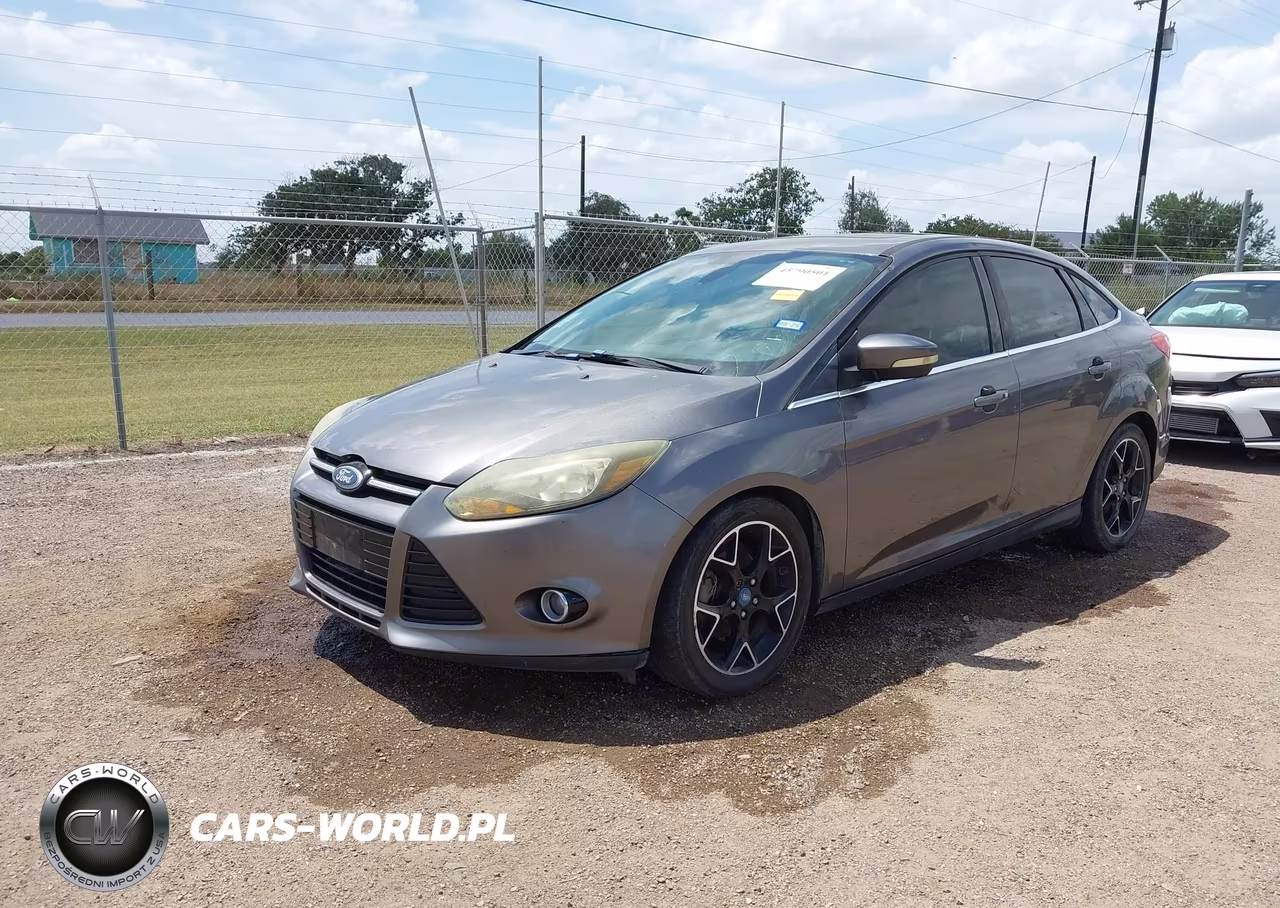 2012 Ford Focus Titanium VIN:1FAHP3J24CL104869 - 2