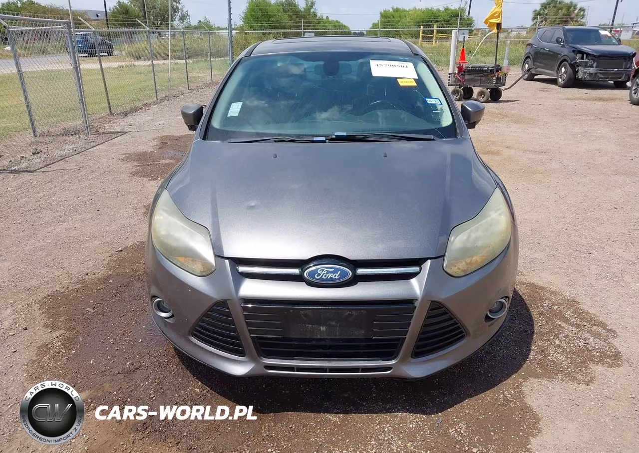 2012 Ford Focus Titanium VIN:1FAHP3J24CL104869 - 6