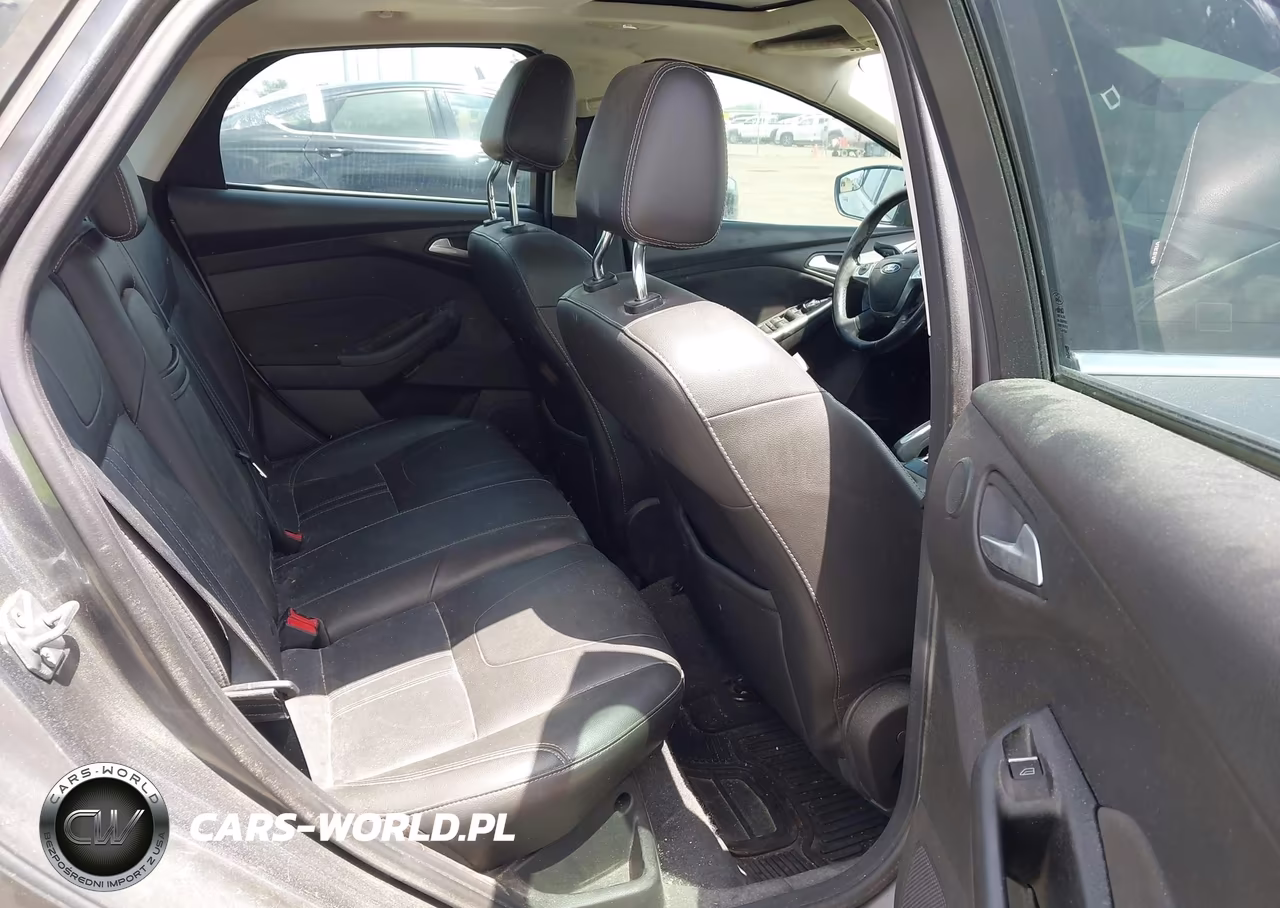 2012 Ford Focus Titanium VIN:1FAHP3J24CL104869 - 8