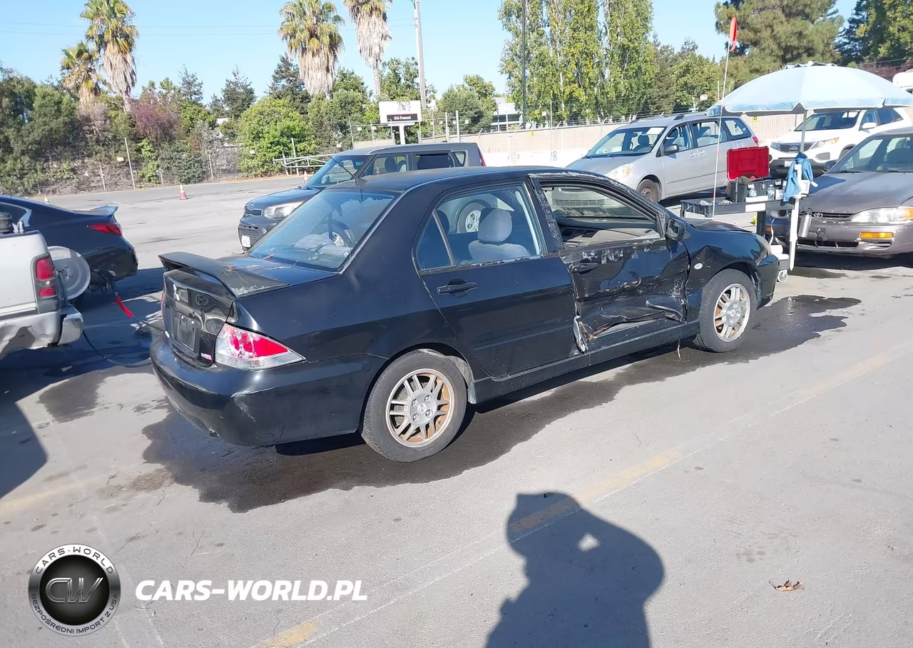 2005 Mitsubishi Lancer Oz Rally VIN:JA3AJ86EX5U030592 - 4
