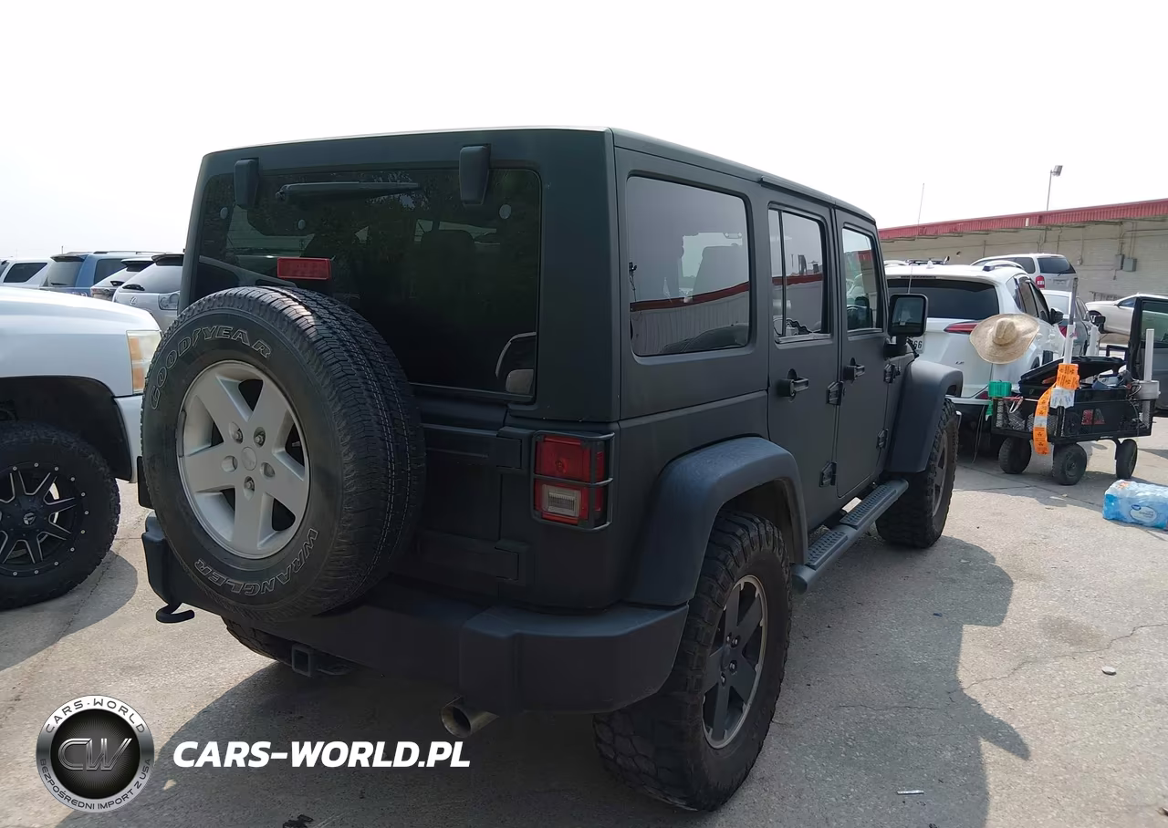 2011 Jeep Wrangler Unlimited Sport VIN:1J4BA3H15BL530691 - 4