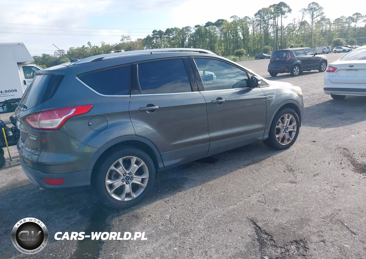 2016 Ford Escape Titanium VIN:1FMCU0J99GUB84092 - 4