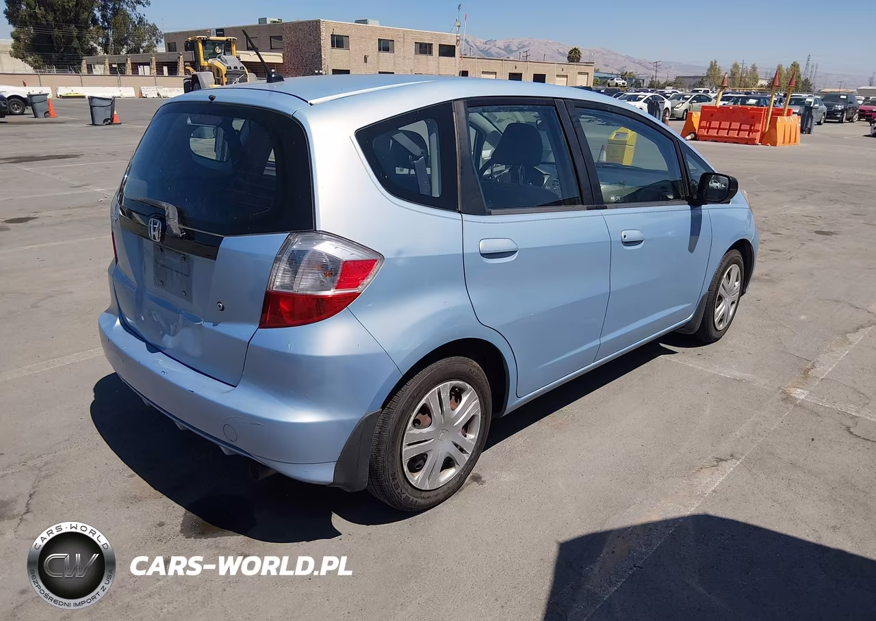 2010 Honda Fit VIN:JHMGE8H28AC036621 - 4