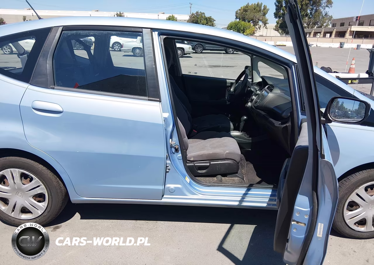 2010 Honda Fit VIN:JHMGE8H28AC036621 - 5