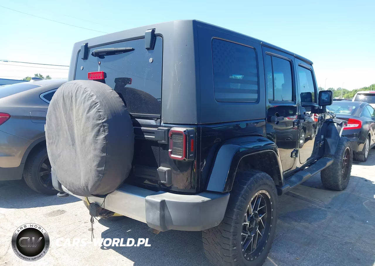 2011 Jeep Wrangler Unlimited 70Th Anniversary VIN:1J4BA7H13BL591447 - 4
