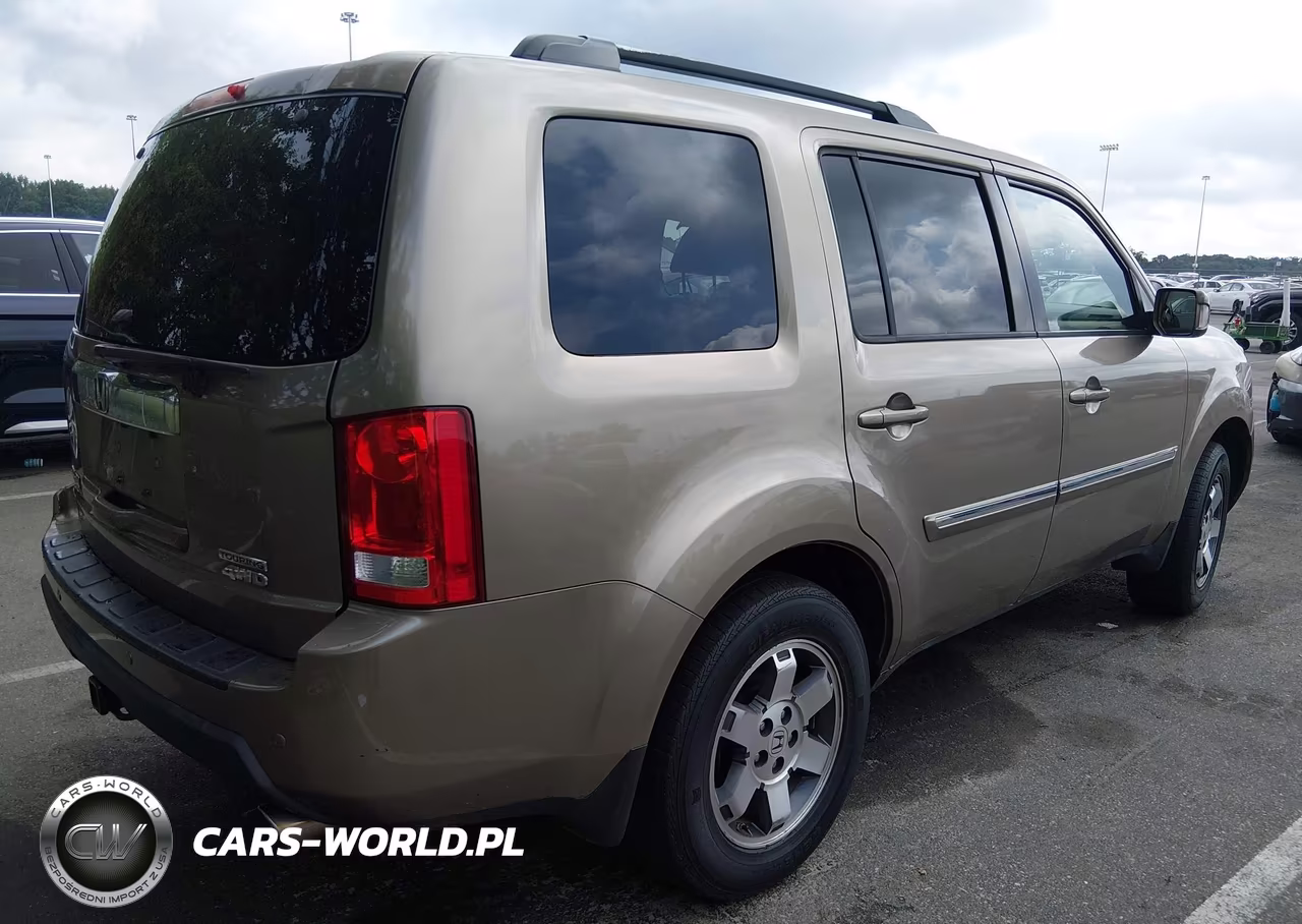 2011 Honda Pilot Touring VIN:5FNYF4H99BB021977 - 4