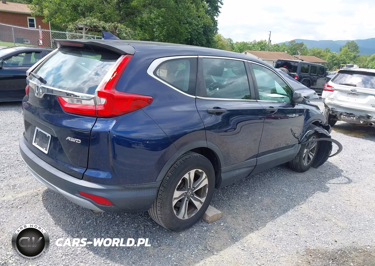 2018 Honda Cr-V Lx VIN:2HKRW6H31JH211283 - 4
