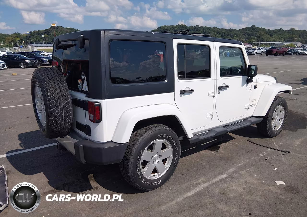 2012 Jeep Wrangler Unlimited Sahara VIN:1C4BJWEG3CL213073 - 4
