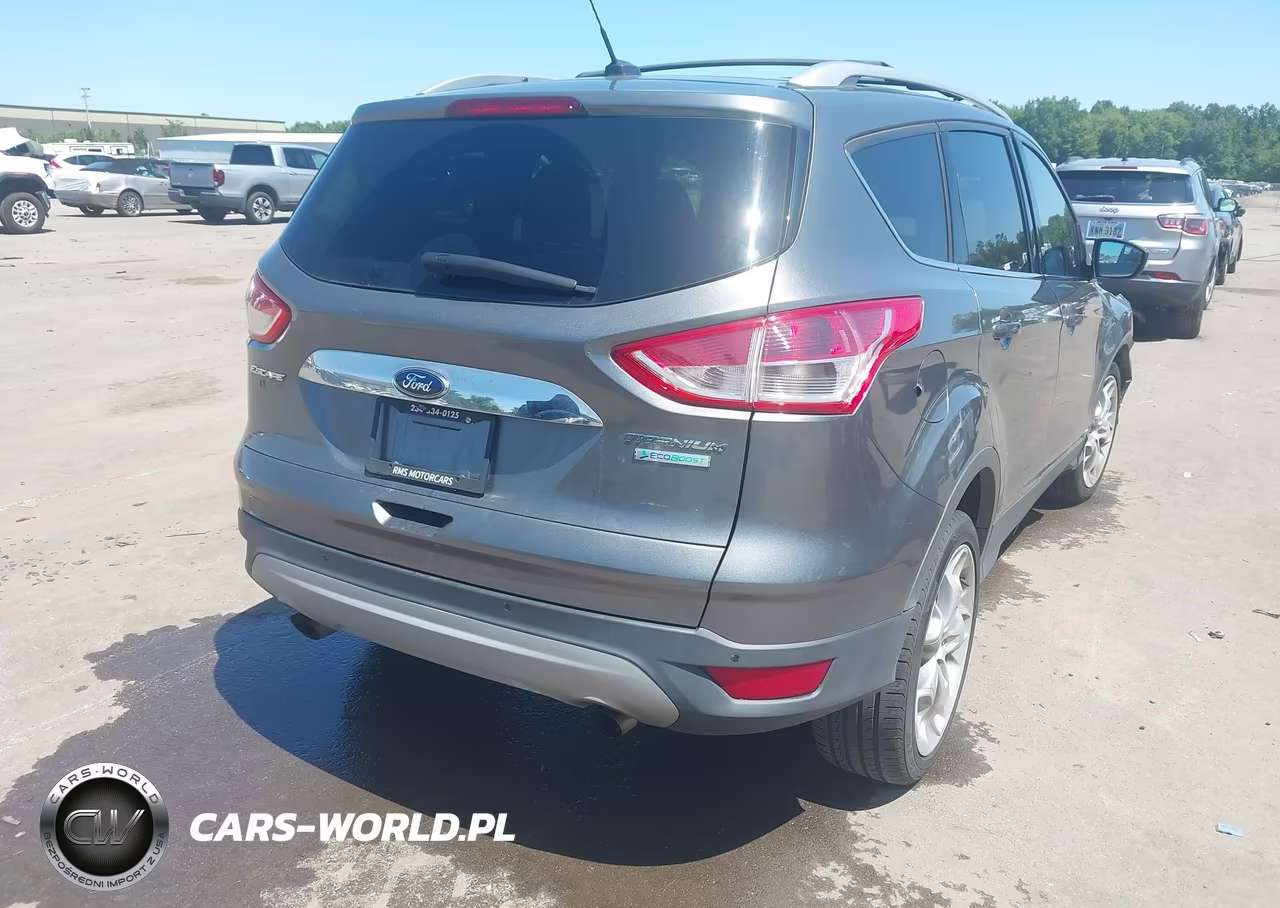 2014 Ford Escape Titanium VIN:1FMCU0J90EUD30571 - 4