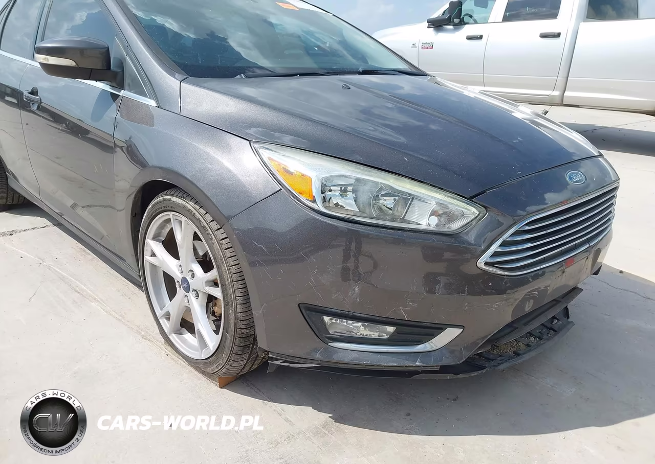 2015 Ford Focus Titanium VIN:1FADP3J28FL334031 - 18