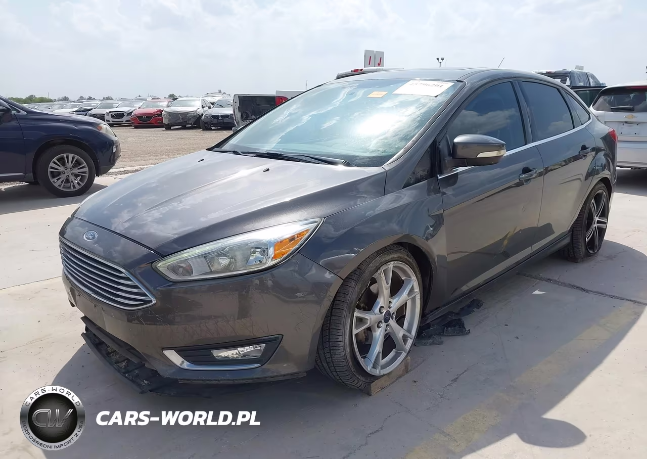 2015 Ford Focus Titanium VIN:1FADP3J28FL334031 - 2