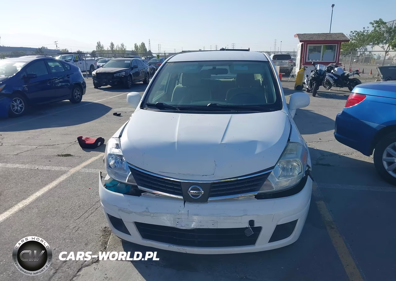 2009 Nissan Versa 1.8S VIN:3N1BC13E19L352567 - 12