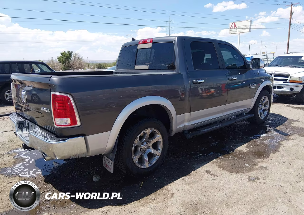 2015 Ram 1500 Laramie VIN:1C6RR7NM4FS687957 - 4