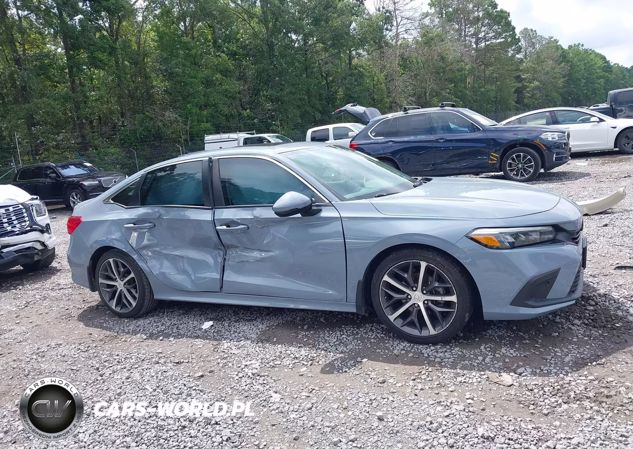 2023 Honda Civic Touring VIN:2HGFE1F9XPH307710 - 13