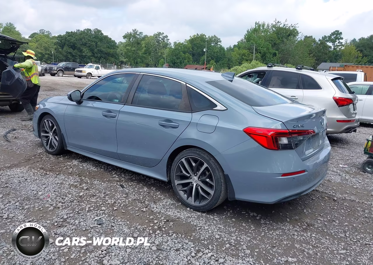 2023 Honda Civic Touring VIN:2HGFE1F9XPH307710 - 3