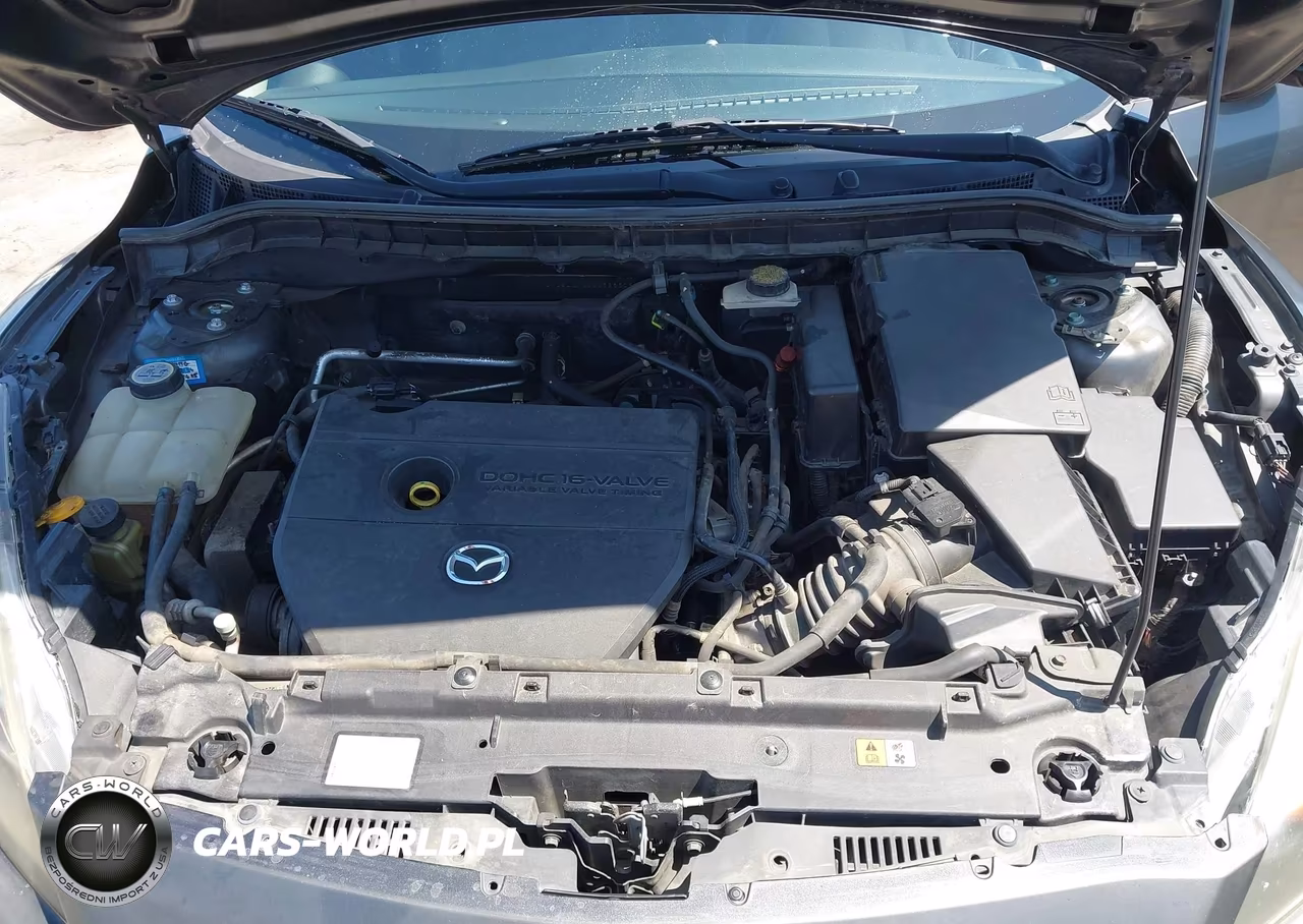 2011 Mazda Mazda3 I Touring VIN:JM1BL1VG1B1386615 - 10