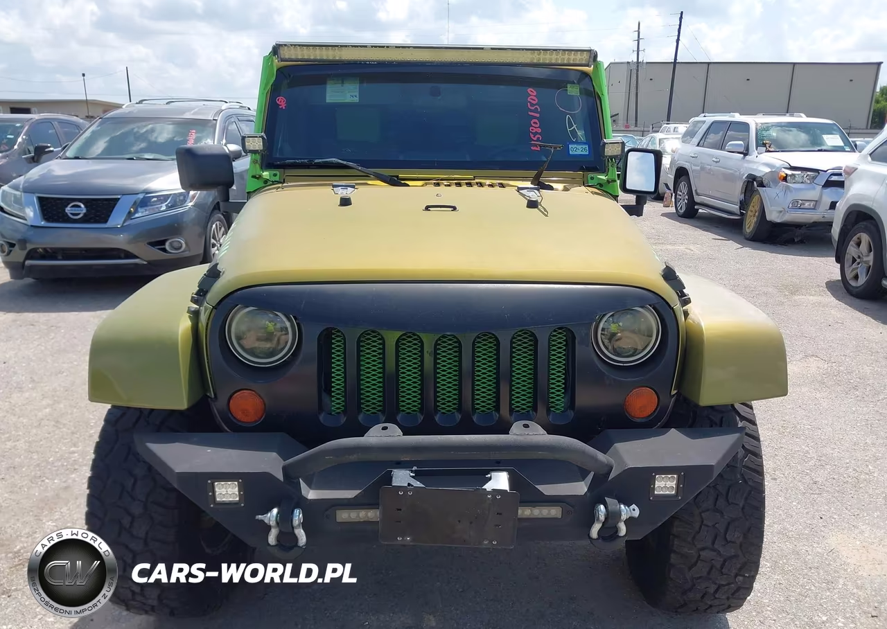 2007 Jeep Wrangler Unlimited Sahara VIN:1J4GA59157L155747 - 12