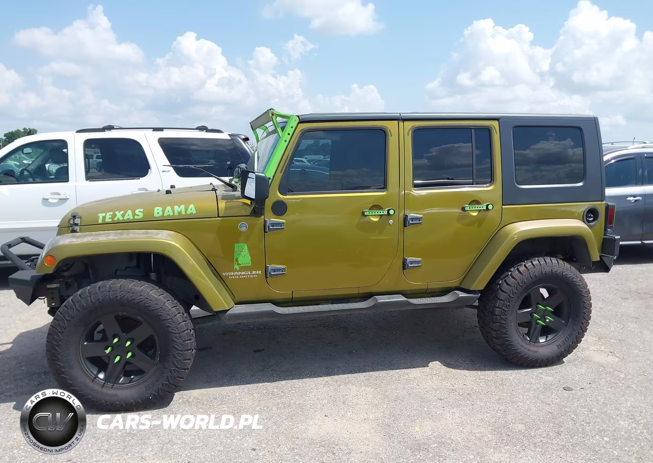 2007 Jeep Wrangler Unlimited Sahara VIN:1J4GA59157L155747 - 14