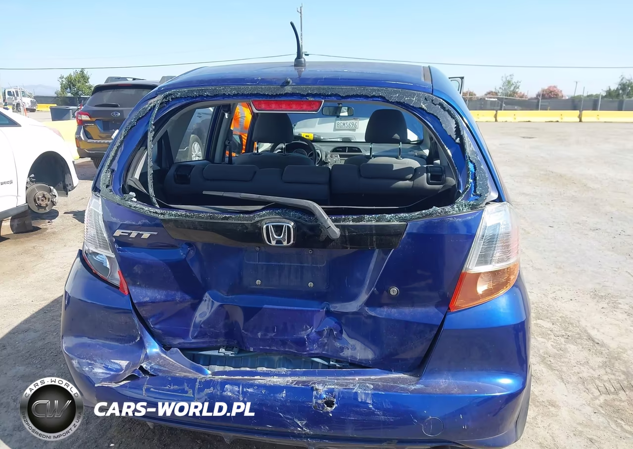 2010 Honda Fit VIN:JHMGE8H22AS012031 - 16