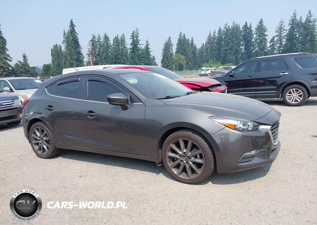 2018 Mazda Mazda3 Touring VIN:3MZBN1L30JM194224 - 13