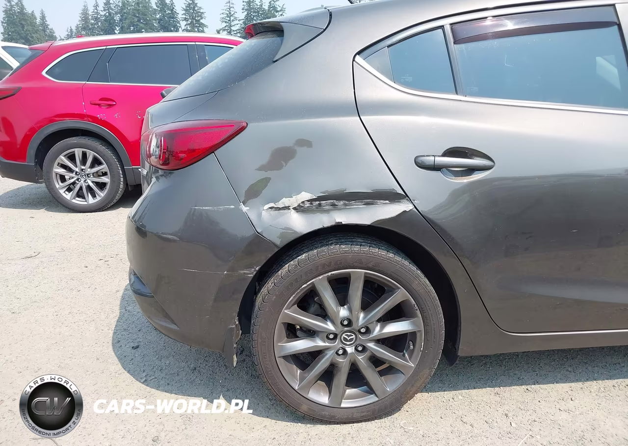 2018 Mazda Mazda3 Touring VIN:3MZBN1L30JM194224 - 6