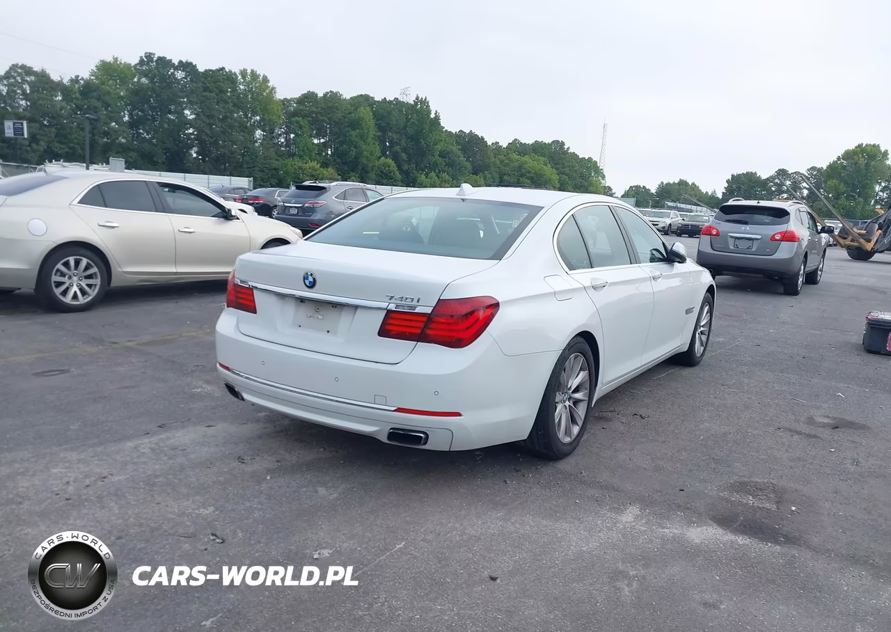 2015 BMW 740I VIN:WBAYA6C52FGK16438 - 4