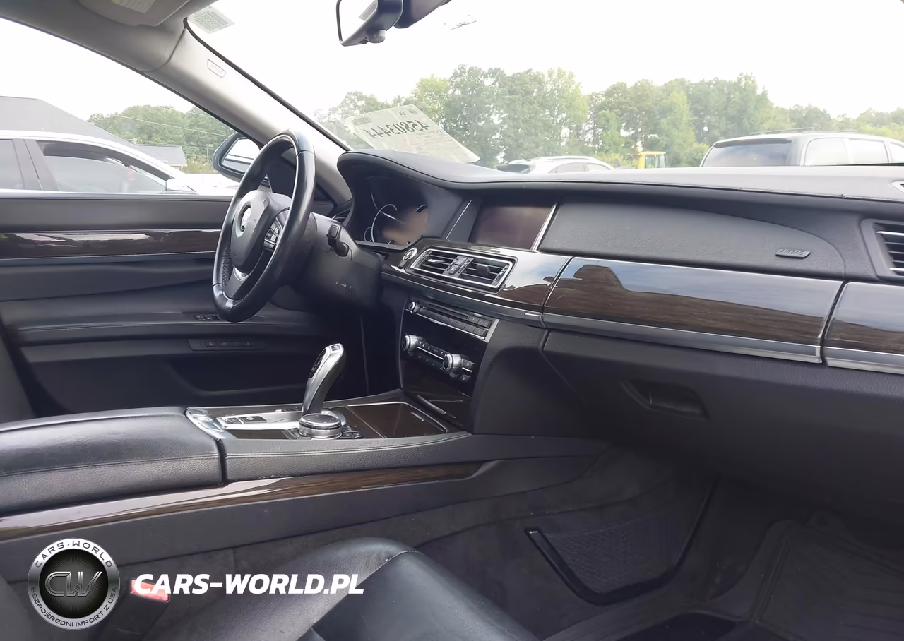 2015 BMW 740I VIN:WBAYA6C52FGK16438 - 5