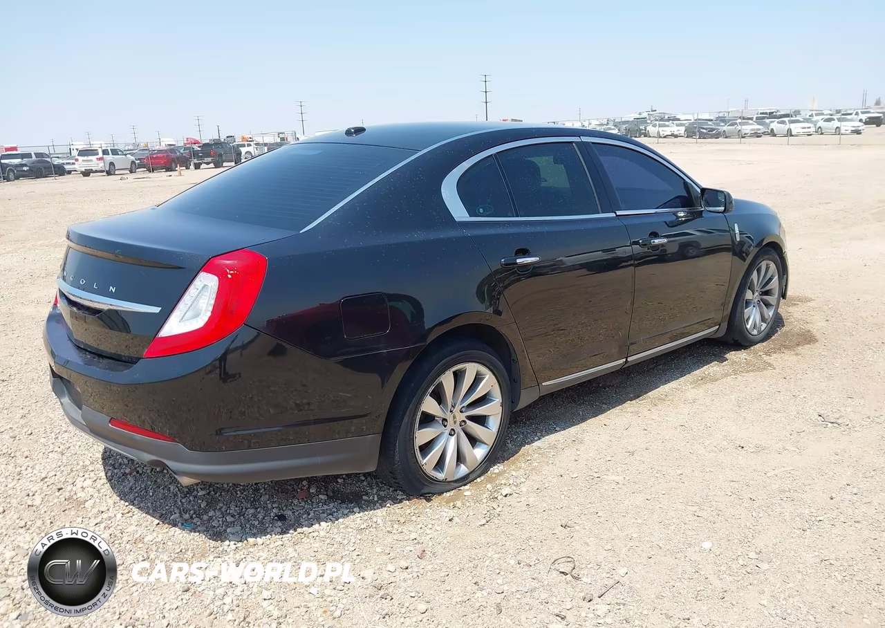 2015 Lincoln Mks VIN:1LNHL9DK2FG607037 - 4