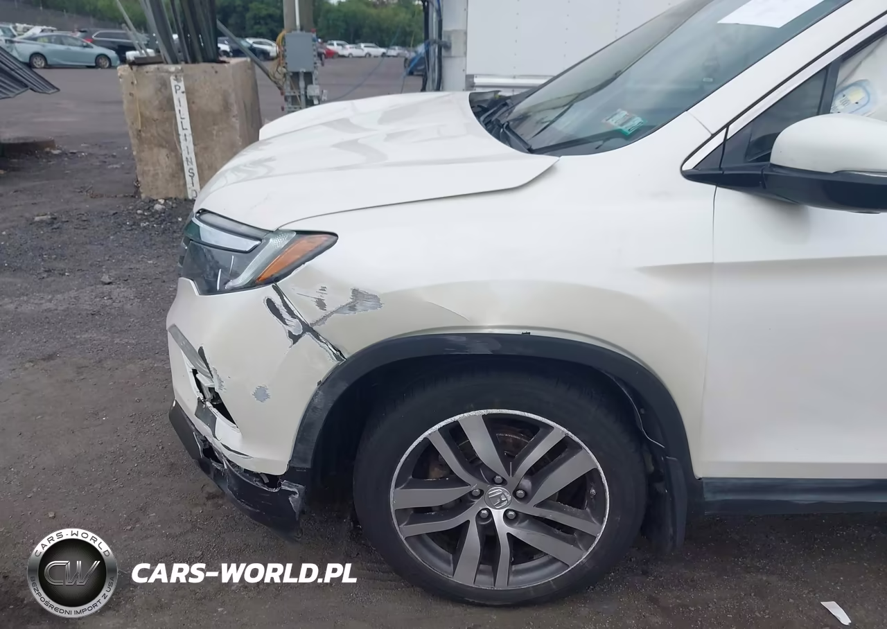 2017 Honda Pilot Elite VIN:5FNYF6H05HB024610 - 6