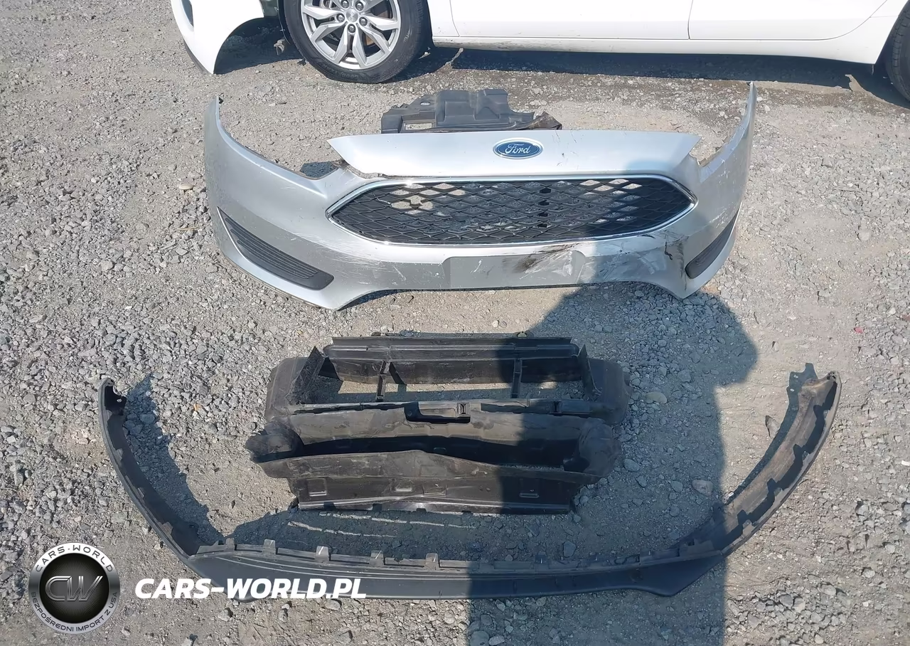 2016 Ford Focus S VIN:1FADP3E23GL355929 - 12
