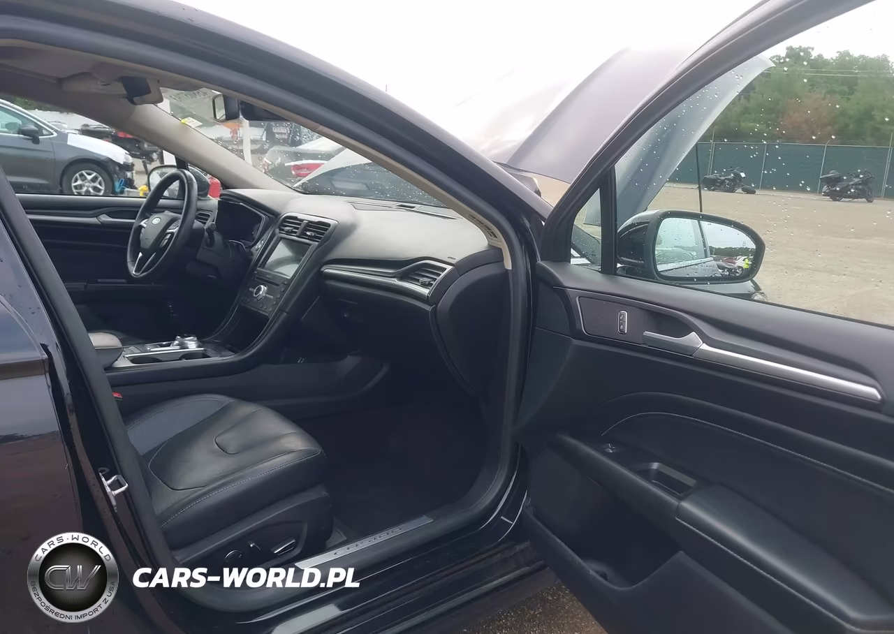 2019 Ford Fusion Hybrid Titanium VIN:3FA6P0RU3KR235609 - 5