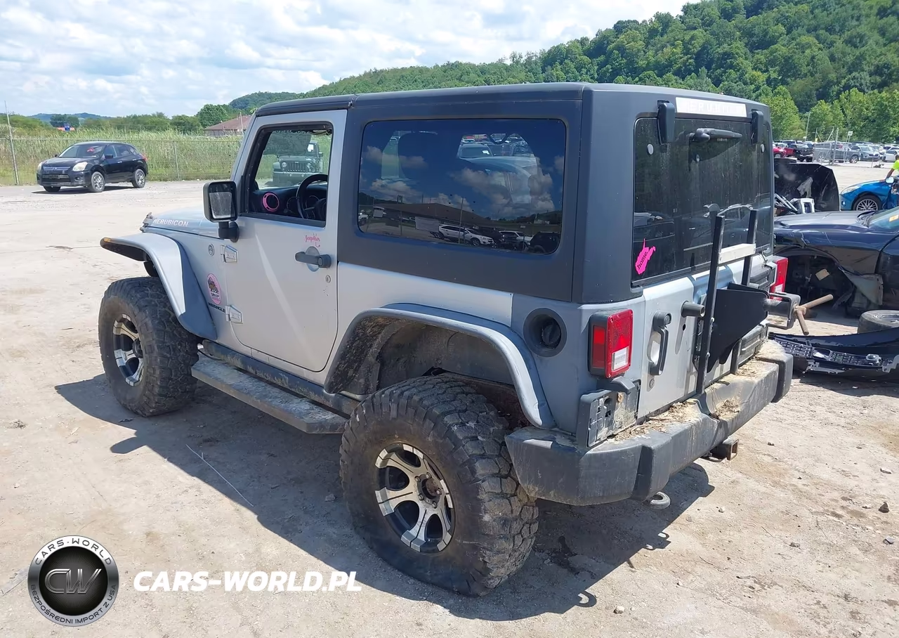2011 Jeep Wrangler Rubicon VIN:1J4BA6D17BL520610 - 3