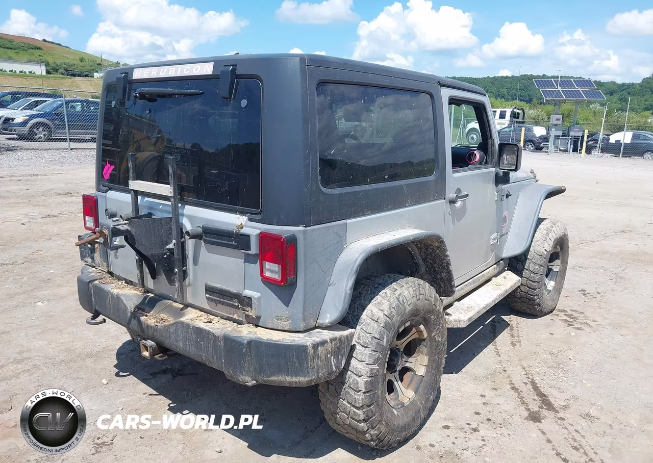 2011 Jeep Wrangler Rubicon VIN:1J4BA6D17BL520610 - 4