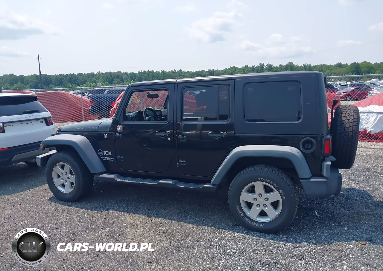 2009 Jeep Wrangler Unlimited X VIN:1J4GA39199L773063 - 14