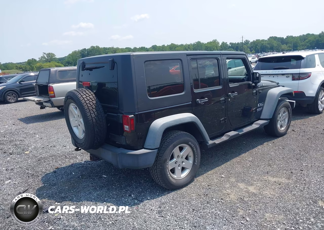 2009 Jeep Wrangler Unlimited X VIN:1J4GA39199L773063 - 4