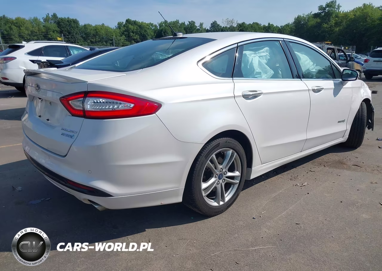2016 Ford Fusion Hybrid Titanium VIN:3FA6P0RU3GR363131 - 4